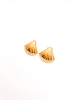 Gold shell-shaped earrings on a white background