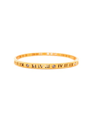 Gold bracelet with Roman numeral design on a white background