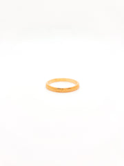 Gold ring on a white background