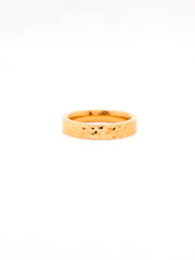 Gold ring on a white background