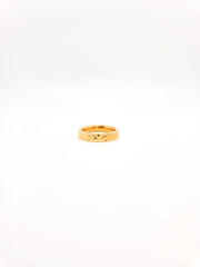 Gold ring on a white background