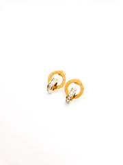 Pair of gold hoop earrings on a white background