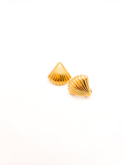 Pair of gold shell-shaped earrings on a white background
