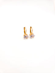 Gold hoop earrings with clear gemstones on a white background